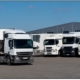 Heavy cargo trucks loading in logistics center for delivery cargo, ©123RF scharfsinn86